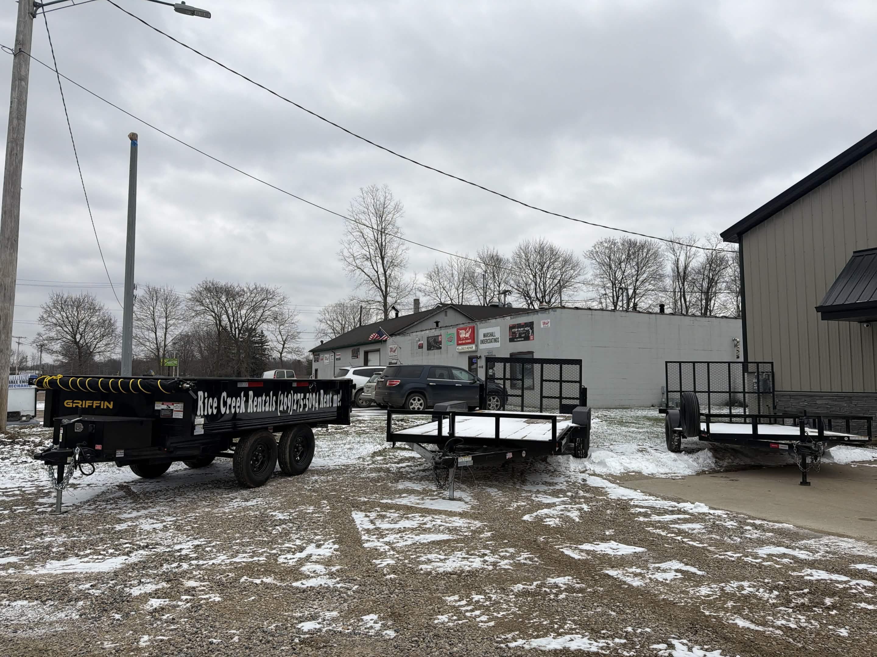 Rice Creek Rentals outdoor lot with dump trailers and utility trailers